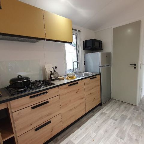 Mobilheim 4 personen - 25m2 (2021) + Halbüberdachte Holzterrasse 8m2. 4 Pers.