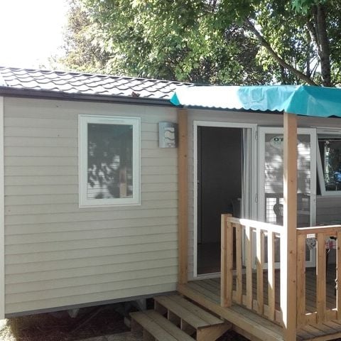 Mobile home 4 persons - 20m² + 8m² covered wooden terrace. 2/4 pers.