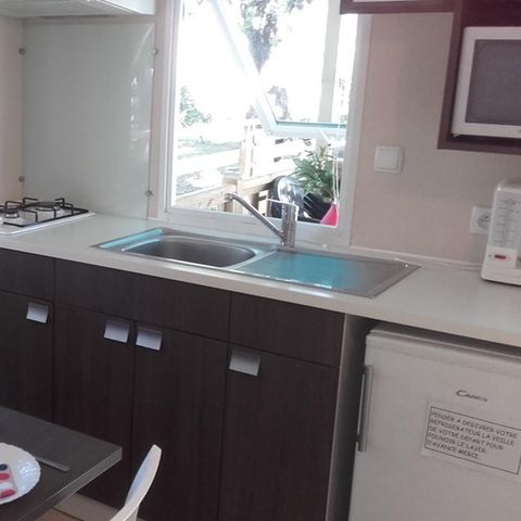 Mobilheim 4 personen - 20m² + Überdachte Holzterrasse 8m². 2/4 Pers.