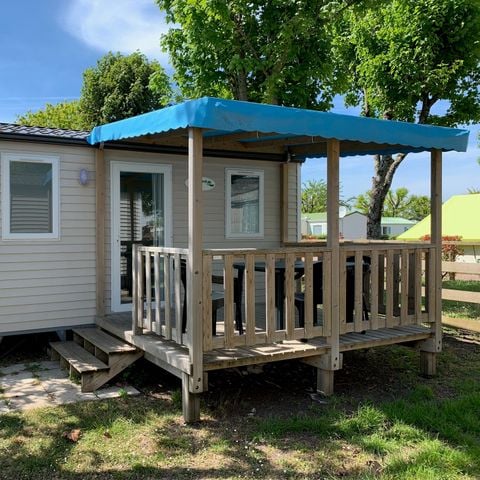 Mobile home 4 persons - 20m² + 8m² covered wooden terrace. 2/4 pers.