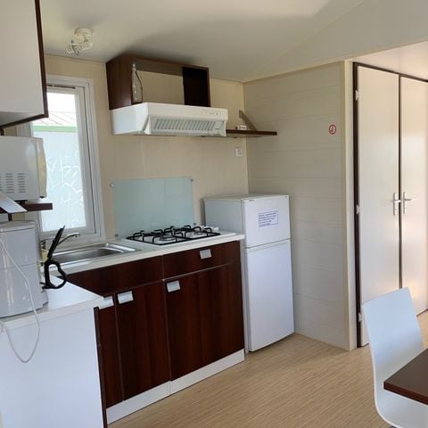 Mobile home 4 persons - 26m² + integrated wooden terrace of 7m². Sleeps 4