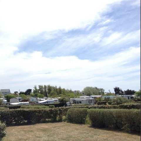 PLOT - Comfort package (1 tent, caravan or camper / 1 car / 10A electricity)