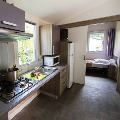 BUNGALOW 4 personnes - Mobil-home PMR | Comfort | 2 Ch. | 4 Pers. | Terrasse surélevée | 1 SDB | TV