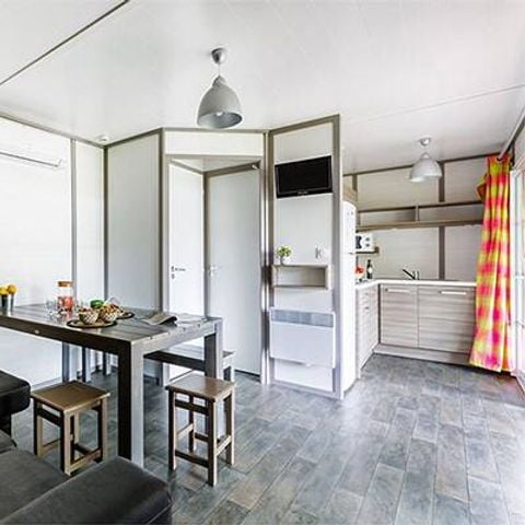 Stacaravan 7 personen - Chalet | Comfort XL | 3 slaapkamers | 5/7 pers. | Verhoogd terras | Airconditioning | TV
