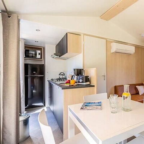 Stacaravan 6 personen - Mobile-home | Premium Exclusive | 3 slaapkamers | 6 pers | Verhoogd terras | Jacuzzi | Buitendouche | 1 badkamer | Airconditioning | TV