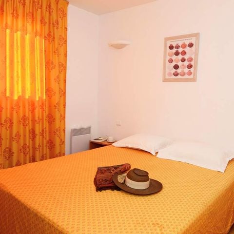 APPARTEMENT 4 personen - (Parkeerkant)