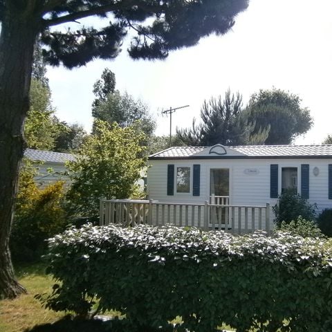 Mobile home 4 persons - 2 bedrooms - wooden terrace - TV