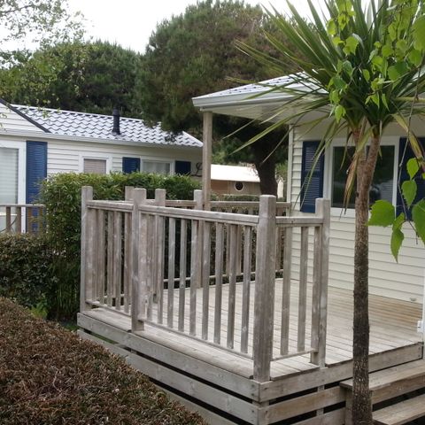 Mobilheim 4 personen - Mobilheim 28 bis 30 m² - 2 Zimmer - halbbedeckte oder überdachte Terrasse - TV -.