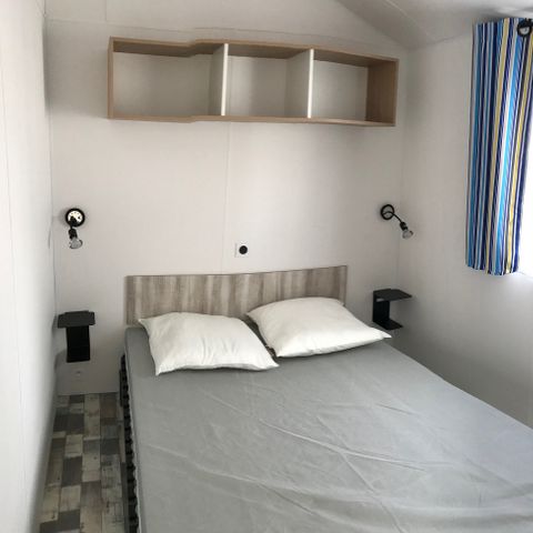 Mobilheim 4 personen - Mobilheim 28 bis 30 m² - 2 Zimmer - halbbedeckte oder überdachte Terrasse - TV -.