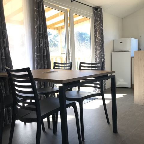 Mobilheim 4 personen - Mobilheim 28 bis 30 m² - 2 Zimmer - halbbedeckte oder überdachte Terrasse - TV -.