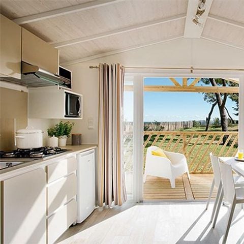 Mobilhome 4 personnes - Confort | 2 chambres | 4 pers. | Terrasse simple | 1 salle de bain | Climatisation | TV