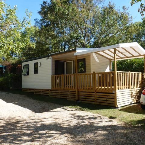 Mobilhome 4 personnes - 26m² climatisé - 2 chambres - Terrasse couverte 20m²