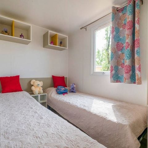 Bungalow 6 personen - Mobile-home | Comfort | 2 slaapkamers | 4/6 pers. | Verhoogd terras | 2 badkamers | Airconditioning.