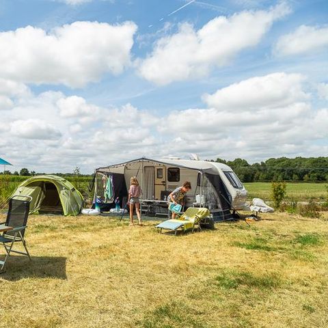 PLOT - Premium pitch package (2 people + 1 vehicle included)