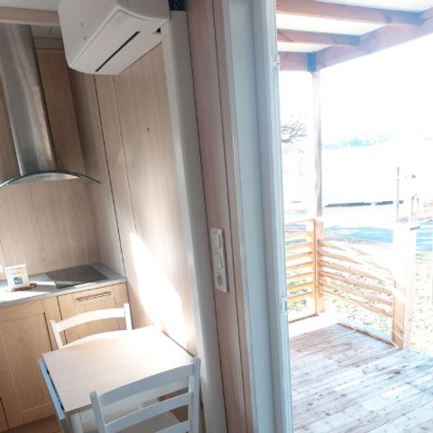Chalet 2 personen - Chalet Confort 16m² - 1 kamer + overdekt terras + TV + airconditioning 2 personen