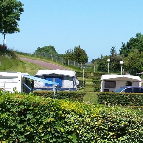 PLOT - Comfort package (1 tent, caravan or camper / 1 car / 16A electricity)