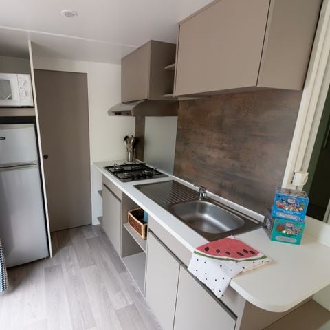 Mobilheim 4 Personen - Komfort Cocoon Clim 28m² (2Sch-4Pers) + Überdachte Terrasse + Klimaanlage