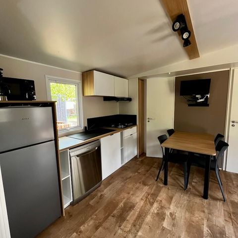 Mobilheim 6 personen - Green HomeFlower Premium 35m² (3Sch - 6Pers.) + Halbüberdachte Terrasse + TV + LV
