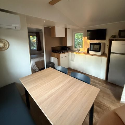 MOBILHOME 2 personnes - PREMIUM 20m² 1 chambre + TV+ Climatisation + Lave-vaisselle + terrasse couverte 10m²