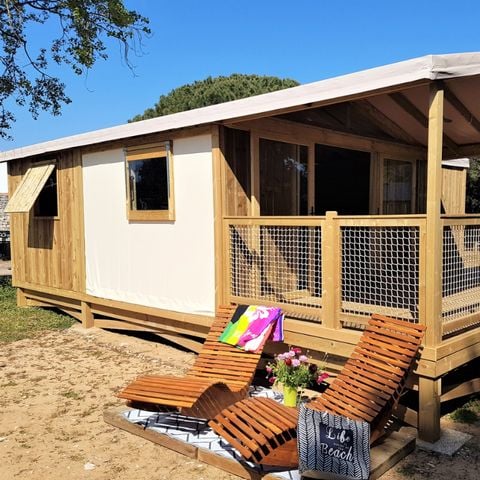 Tente en toile et en bois 4 personnes - Cosyflower Premium 38m² - 2 chambres + TV + draps + serviettes + terrasse semi-couverte 11m² 4/5 pers