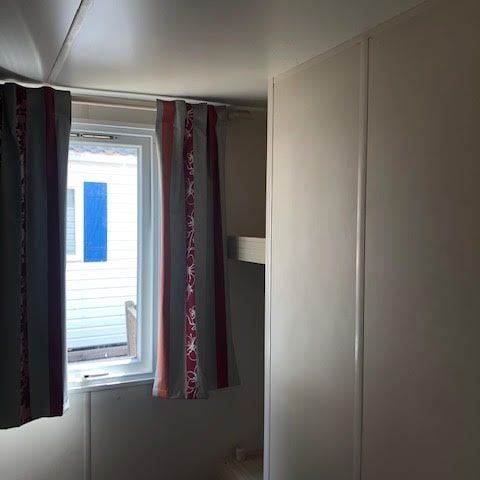 MOBILHOME 4 personnes - 2 chambres sans sanitaires cuisine extérieur