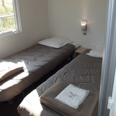 MOBILHOME 4 personas - Confort 4p (27m²) con terraza cubierta, 2 dormitorios, aire acondicionado