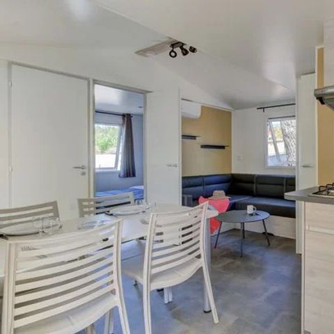 BUNGALOW 4 personnes - Mobil-home | Comfort XL | 2 Ch. | 4 Pers. | Terrasse surélevée | Clim.