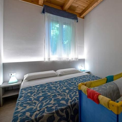 Chalet 4 persone - PEONIA (attrezzatura per bambini inclusa)