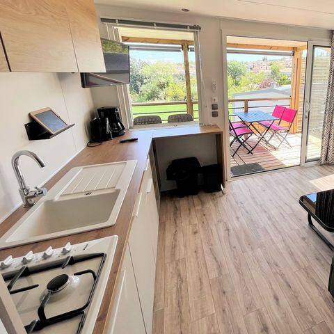 Mobile home 4 persons - Living Confort 27m² 2 bedrooms + integrated covered terrace + air conditioning + TV
