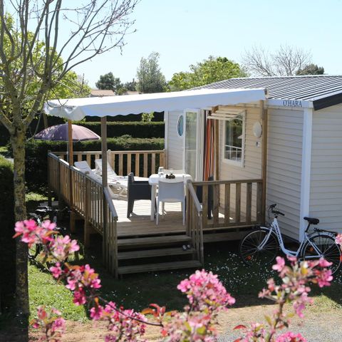 Mobilheim 4 personen - Mobilheim CONFORT 27,5m² (2 Zimmer) + TV + halbüberdachte Terrasse | 4 Personen