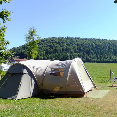 PLOT - Tent or caravan pitch (including 1 car) with electricity