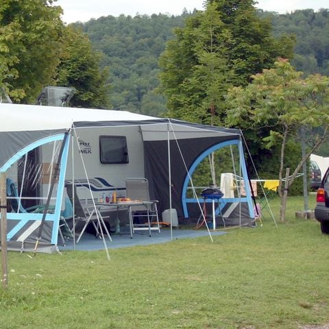 Pitch - Tent or caravan pitch (including 1 car) with electricity
