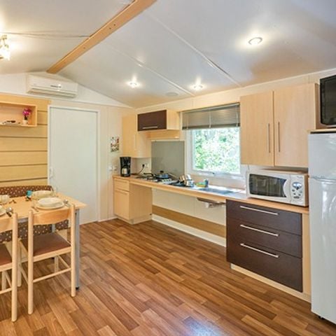 BUNGALOW 4 personnes - Mobil-home PMR | Comfort XL | 2 Ch. | 4/6 Pers. | Terrasse surélevée | Clim. | TV