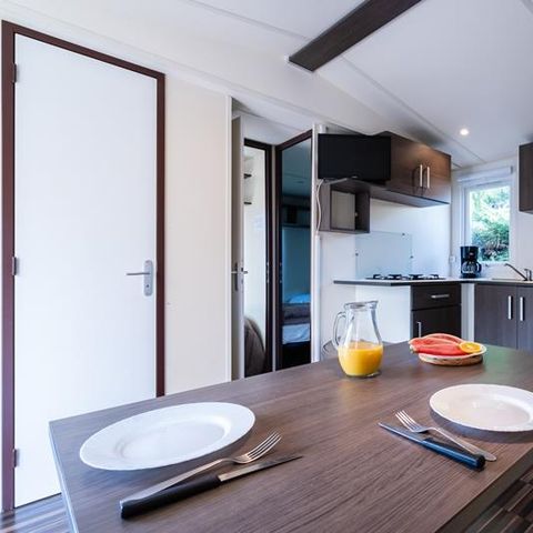 BUNGALOW 2 personnes - Mobil-home Plage 18.6m² (+ de 10 ans) (1 chambre) + Terrasse bois semi-couverte + TV 2 pers