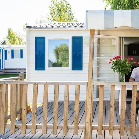 Mobilheim 2 Personen - Mobilheim Strand 18.6m² (+ 10 Jahre) (1 Zimmer) + Halbüberdachte Holzterrasse + TV 2 Pers.