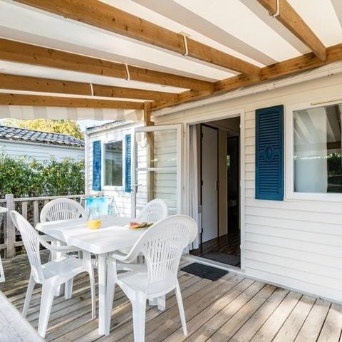 BUNGALOW 2 personnes - Mobil-home Plage 18.6m² (+ de 10 ans) (1 chambre) + Terrasse bois semi-couverte + TV 2 pers