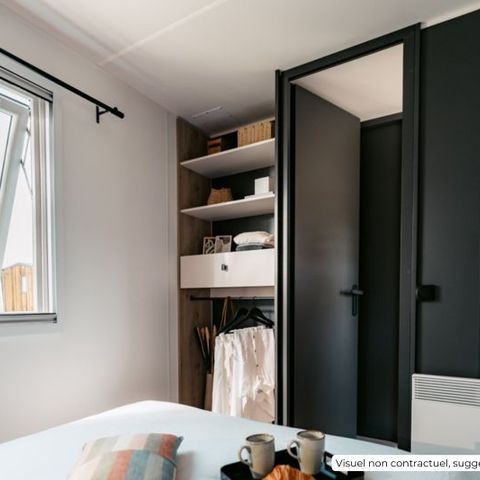 BUNGALOW 2 personnes - Homeflower Premium - 1 chambre + Terrasse semi-couverte + TV + LV + Clim + Draps inclus