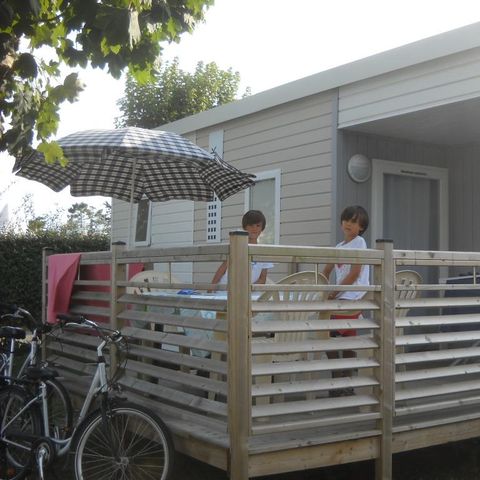 Mobilheim 4 personen - Comfort 25m² (2 Zimmer) + halbüberdachte Terrasse 10m² + TV | 4 Personen