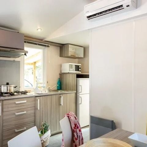 Stacaravan 6 personen - Comfort | 2 Slaapkamers | 4/6 Pers. | *Verhoogd terras* | 1 Badkamer | Airconditioning.