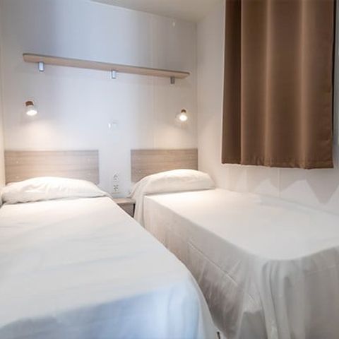 Stacaravan 4 personen - Comfort XL | 2 Slaapkamers | 4 Pers | Verhoogd terras | Airconditioning