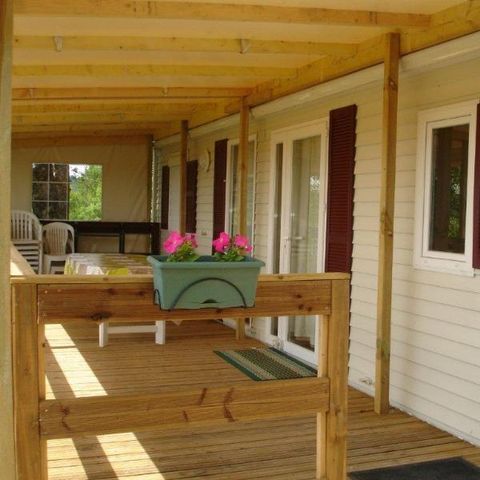 Stacaravan 4 personen - 36 Résidence les genêts 32M2, Overdekt terras, Televisie + vaatwasser 1/4 pers.