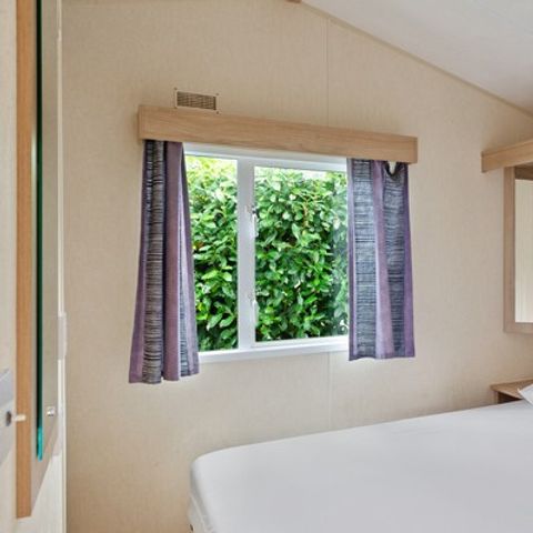 Stacaravan 4 personen - Klassiek | 2 Slaapkamers | 4 Pers. | Verhoogd terras | Airconditioning.