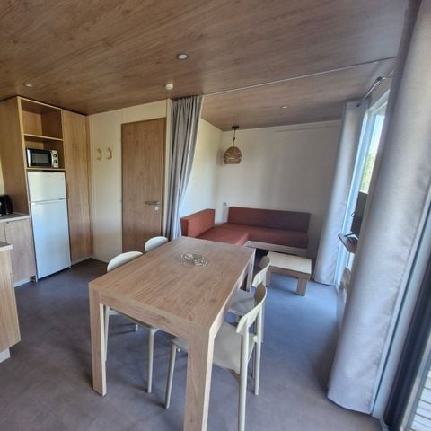 Stacaravan 4 personen - Aquitaine Premium uitzicht op het meer 29m² 2bed-4p+overdekt terras+TV +vaatwasser +chiliennes