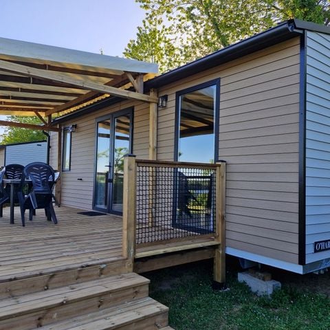 Stacaravan 4 personen - Aquitaine Premium uitzicht op het meer 29m² 2bed-4p+overdekt terras+TV +vaatwasser +chiliennes