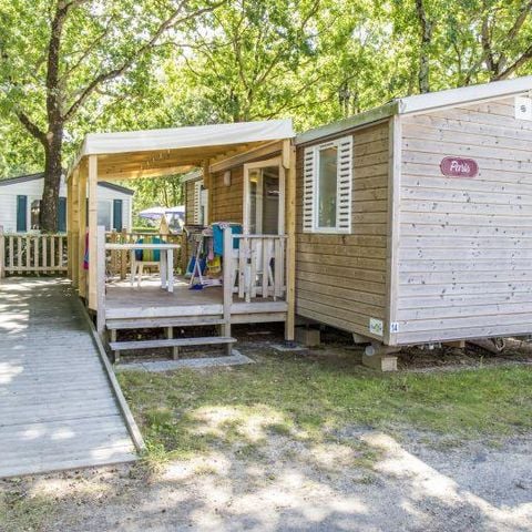 Stacaravan 5 personen - C- Stacaravan Hélios - PMR - airconditioning - 2 kamers 32m² met overdekt terras
