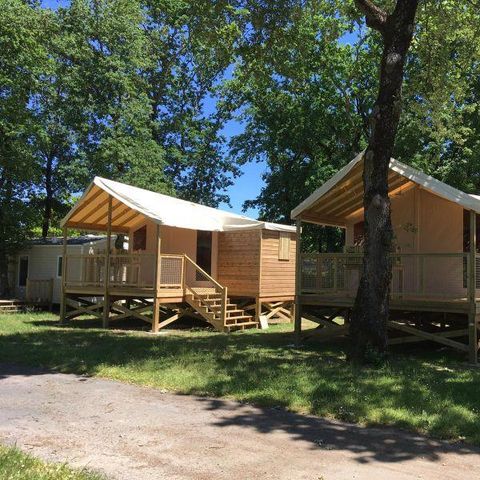 Safarizelt 5 personen - C- Lodge pilotis - 2 Zimmer 24m² mit überdachter Terrasse