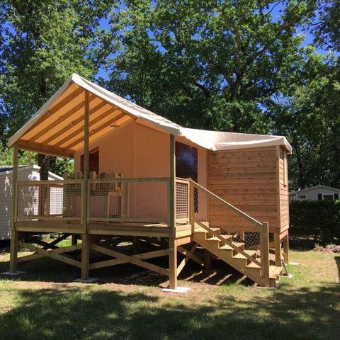 Canvas and wooden tent 5 persons - C- Stilt lodge - 2 rooms 24m² with covered terrace