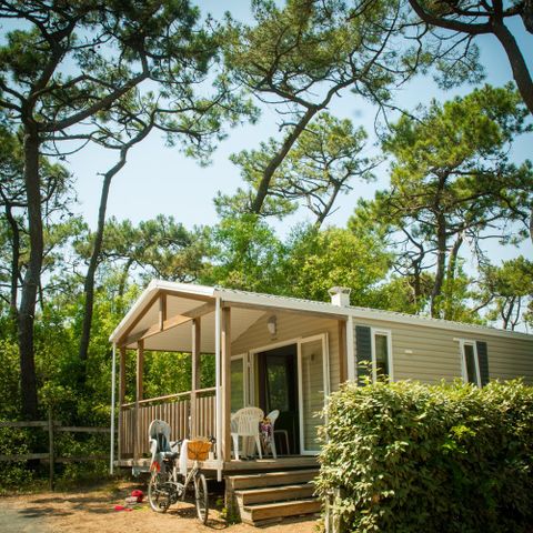 BUNGALOW 4 personnes - ECO Mobil home 2ch. LUDISIA (de + 10 ans) 24 m² + Terrasse semi-couverte 4 pers
