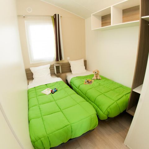 Mobilheim 4 Personen - ECO Mobilheim 2 Schlafz. LUDISIA (ab 10 Jahren) 24 m² + halbüberdachte Terrasse 4 Pers.