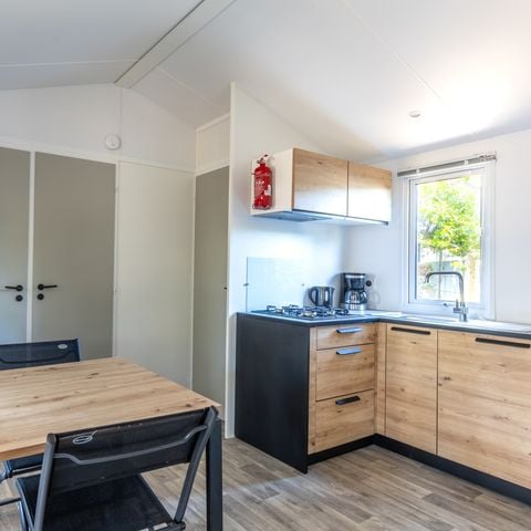 Stacaravan 6 personen - MH Modulo DUO BOIS 2 slaapkamers 29 m² met overdekt houten terras en solarium houten terras
